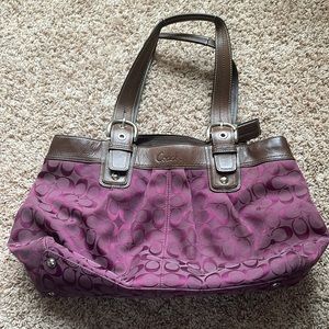 Coach signature Soho Tote and matching wallet.